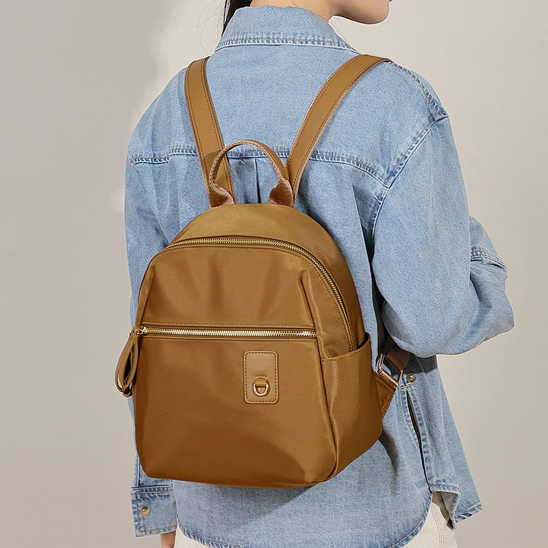 Compact Nylon Backpack with Multiple Pockets