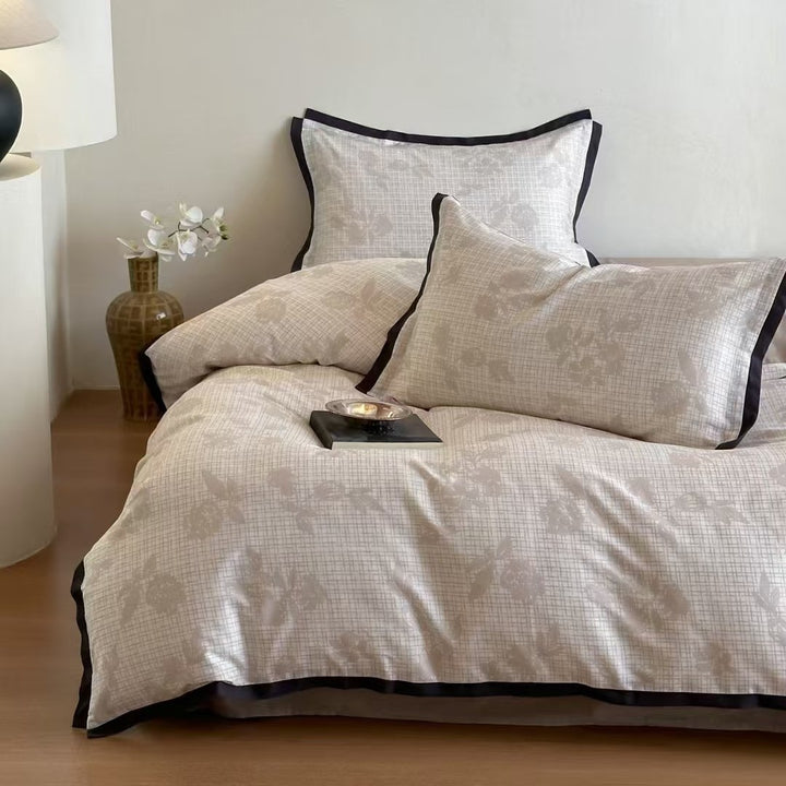 Duvet cover set with fine check pattern and subtle floral relief made of cotton blend