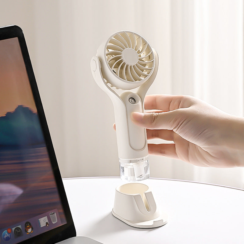 Unisex portable handheld fan with tiltable head, foldable stand and USB charging station Kalsten