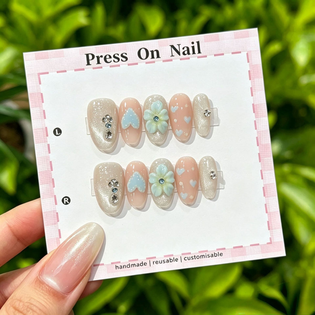 Artistic Press-On Nail Art Set with Cute Character and Bow Accents