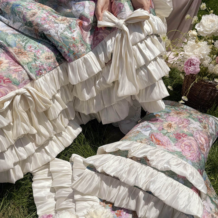 Luxurious bedding set with ruffles, bed skirt, and floral print