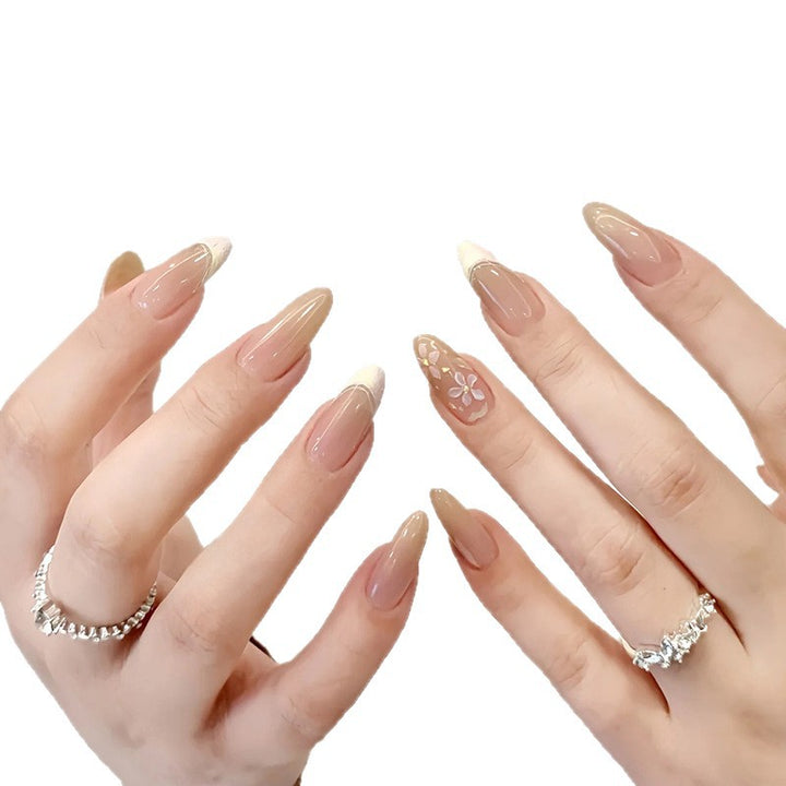 Artificial nails with sweet animal motifs and elegant French tip design Kalsten