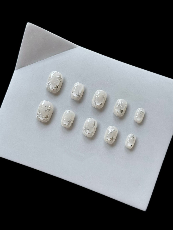 Artistic Press-On Nail Set with Celestial Star Accents