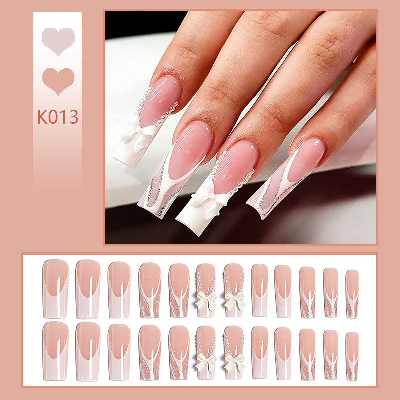 Artificial nail set with elegant bow and pearl decorations Kalsten