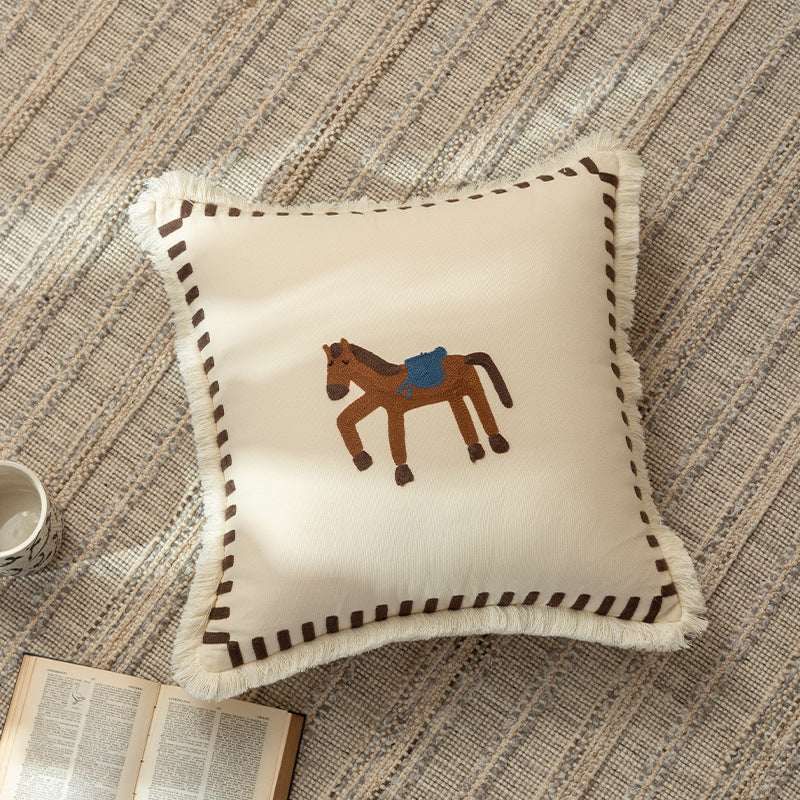 Decorative cushion cover made of cotton blend with fringes, check pattern and embroidered house Kalsten