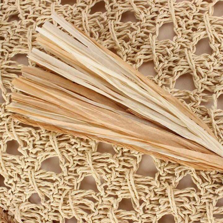 Handbag Made of Hand-Woven Natural Material with Appealing Tassel Detail Kalsten