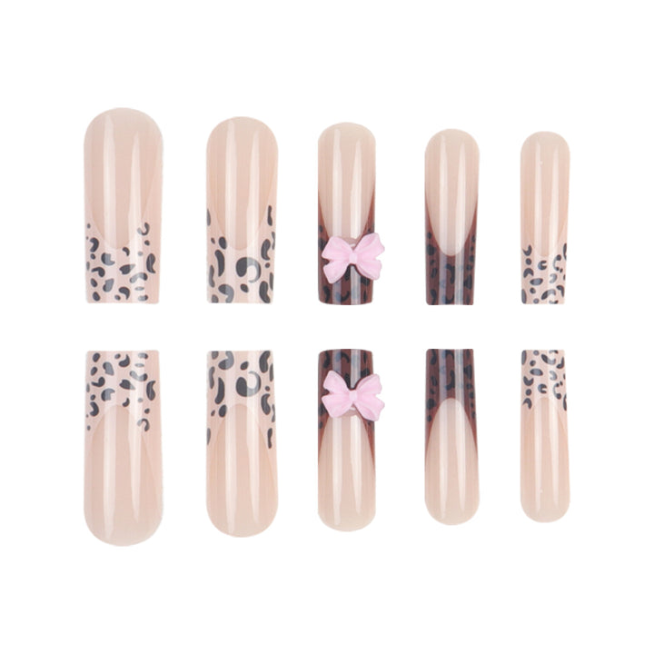 Decorative Stiletto Nail Extensions with Bow Accents Kalsten