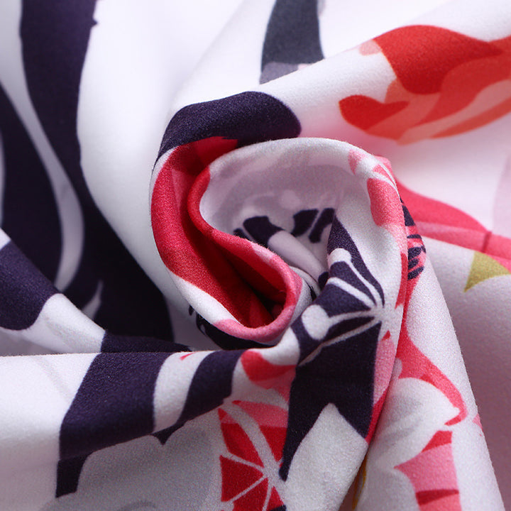 Beach towel with vibrant flamingo motifs and quick-drying material Kalsten