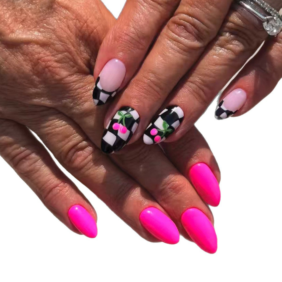Creative artificial nails with playful cherry and checkerboard design Kalsten