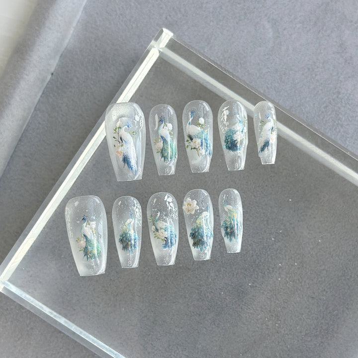 Artistic Press-On Nail Art Set with Heart and Celestial Designs