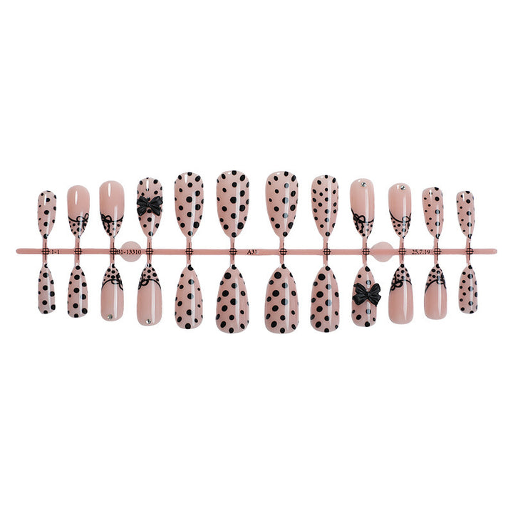 Nail art set with elegant polka dot and bow motifs Kalsten