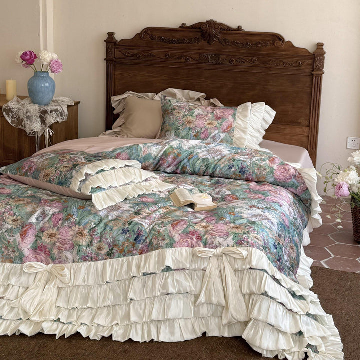Luxurious bedding set with ruffles, bed skirt, and floral print