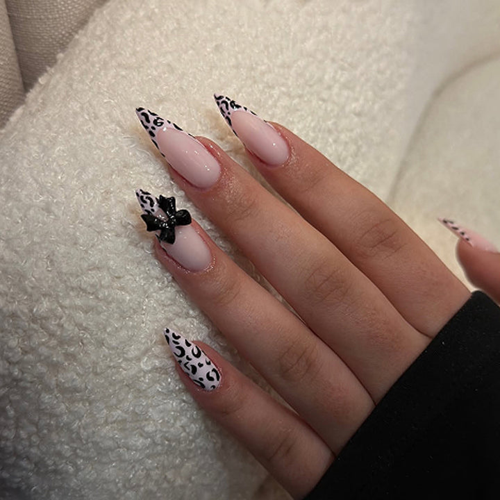 Artful Stiletto Nails with Leopard Print and Bow Accent Kalsten