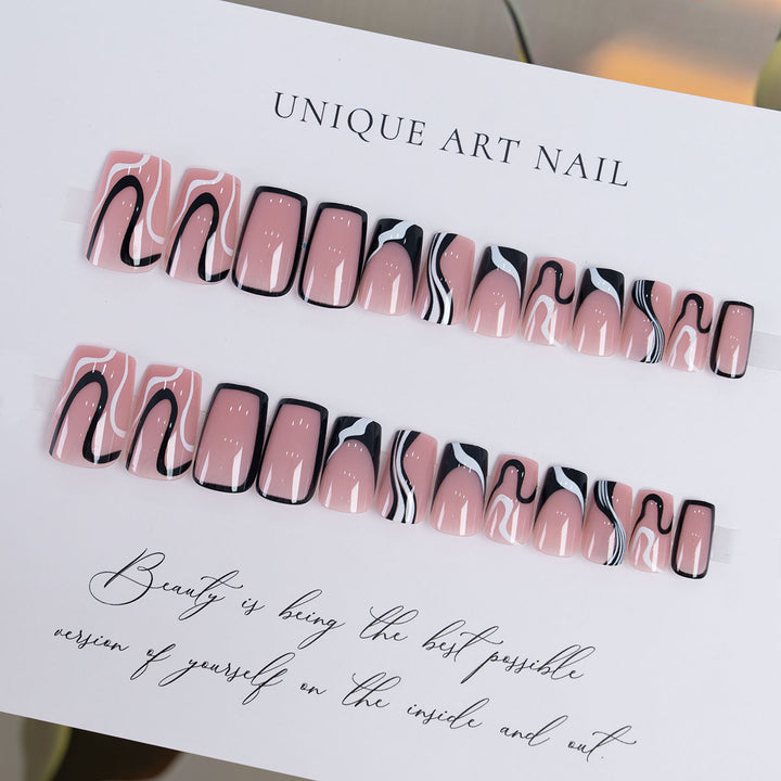 Artistic Long Press-On Nails with Unique Swirl Design