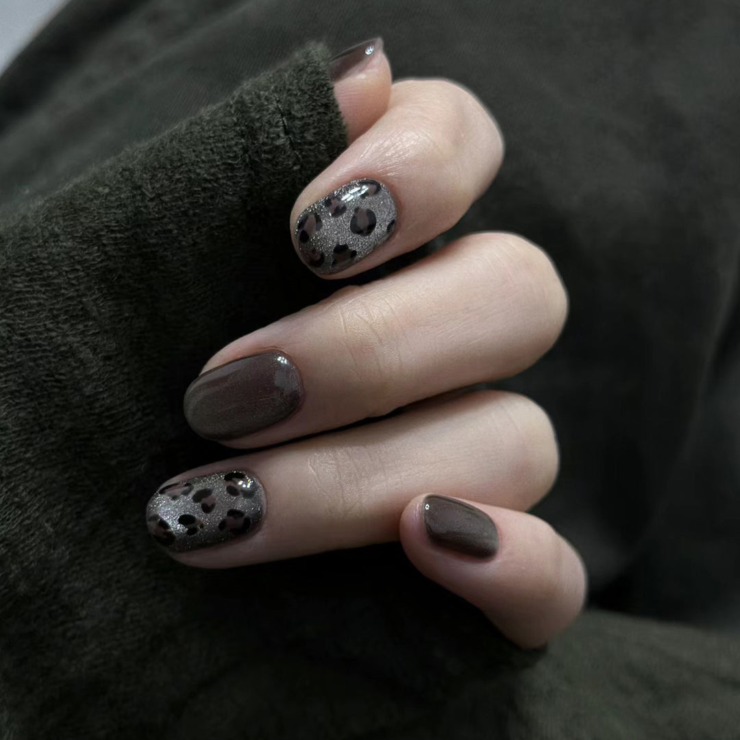 Artistic Press-On Nail Design with Glossy and Textured Patterns Kalsten