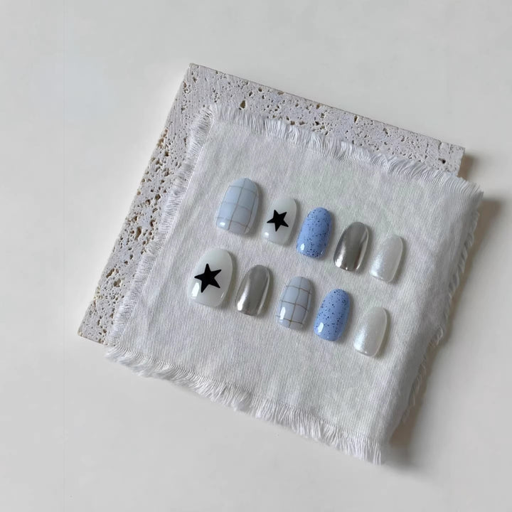 Artistic Press-On Nail Set with Geometric and Star Patterns