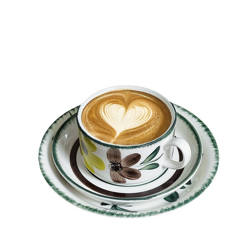Porcelain cappuccino set with botanical brush painting and elegant rim decoration