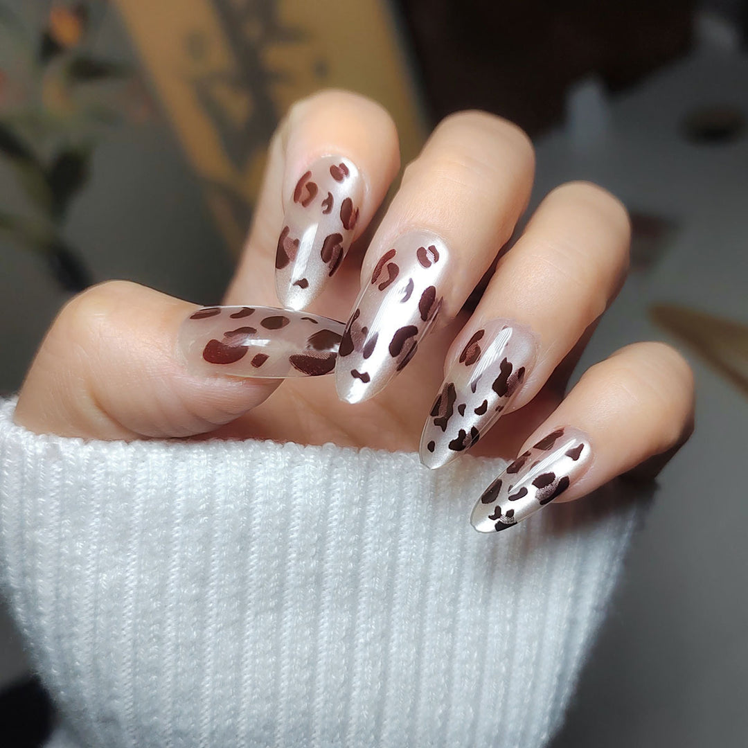 Artistic Stiletto Press-On Nail Design with Leopard Print
