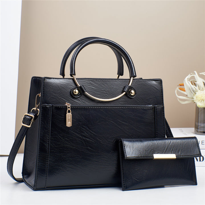 Elegant handbag with detachable shoulder strap and matching wallet Kalsten