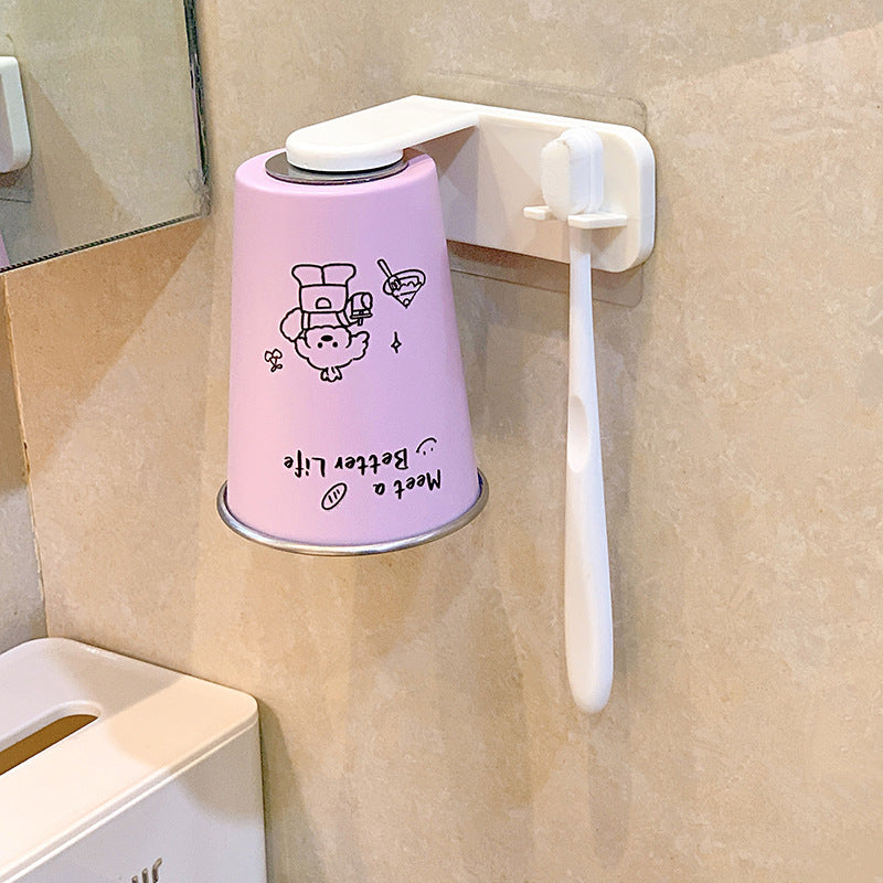 Wall-mounted toothbrush holder with playful design Kalsten