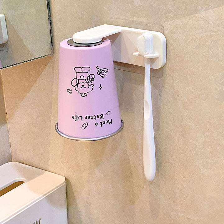 Wall-mounted toothbrush holder with playful design Kalsten