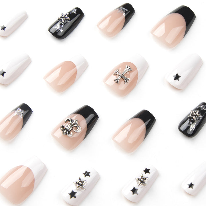 Artful nail art with star motifs and glitter accents Kalsten