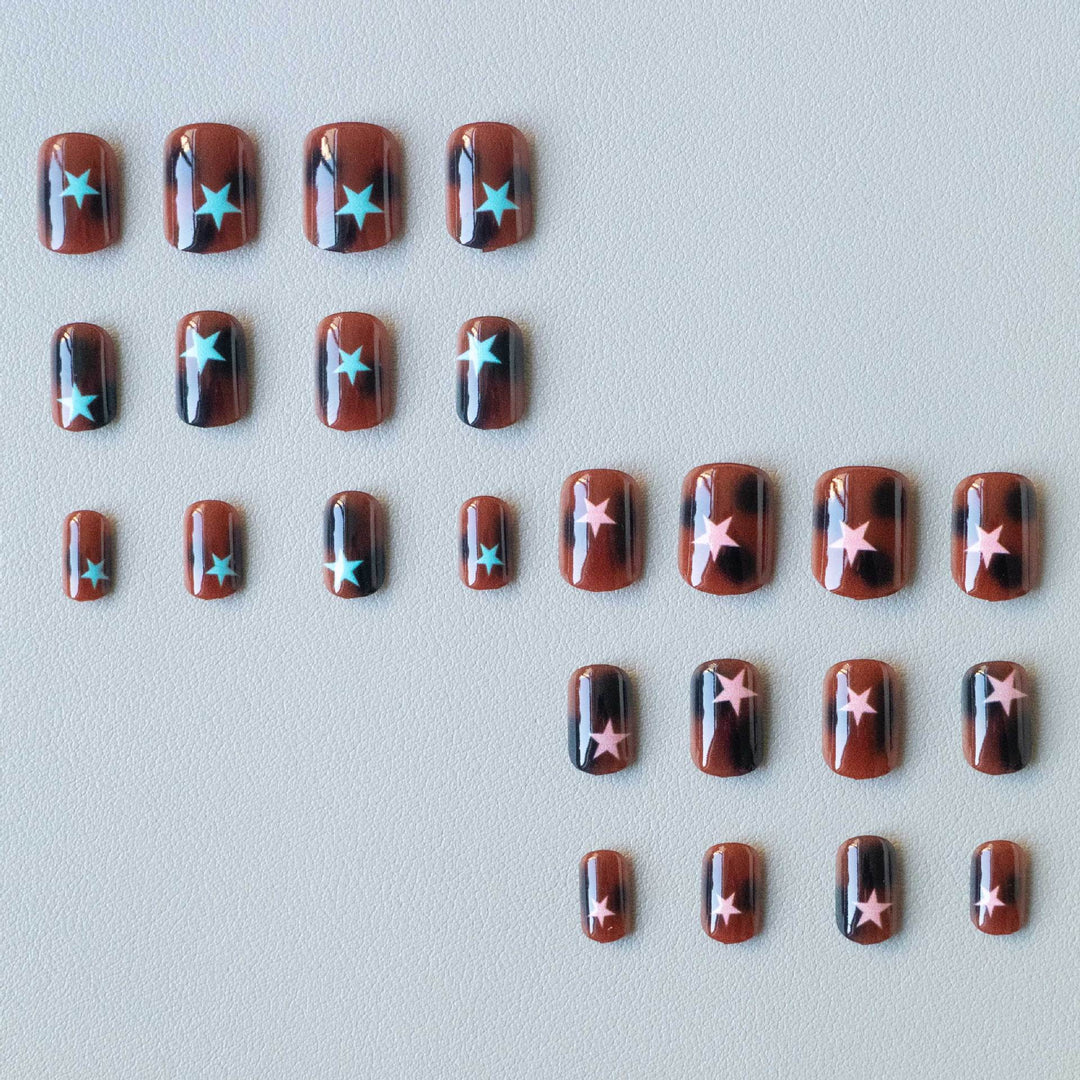 Artistic Star Motif Nail Art