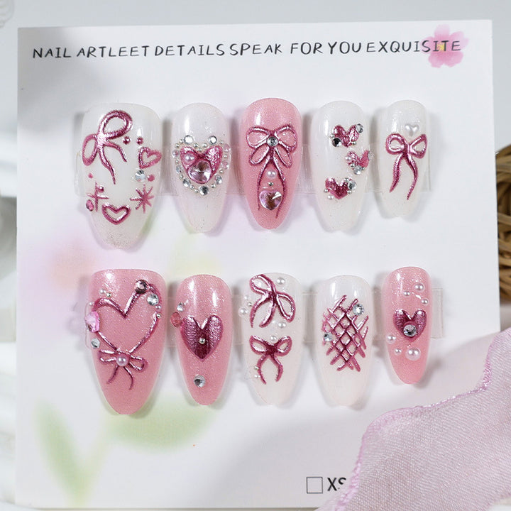 Artificial nail set with romantic bow and heart designs Kalsten