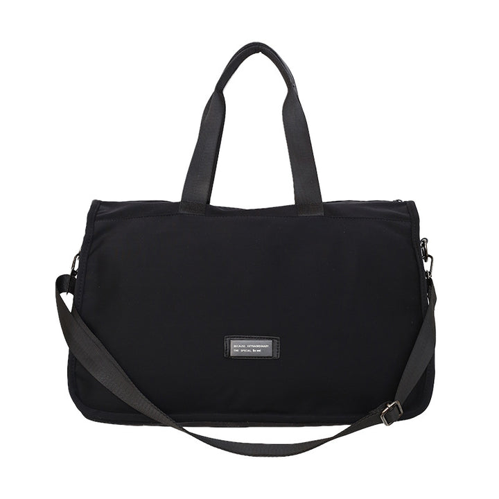 Sporty travel bag with ergonomic carrying handles and versatile compartments Kalsten