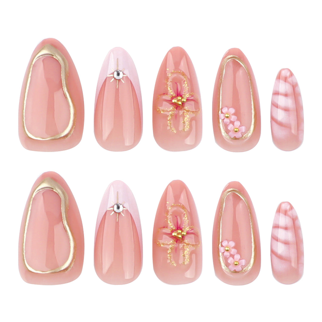 Artful nail design with glitter and floral accents Kalsten