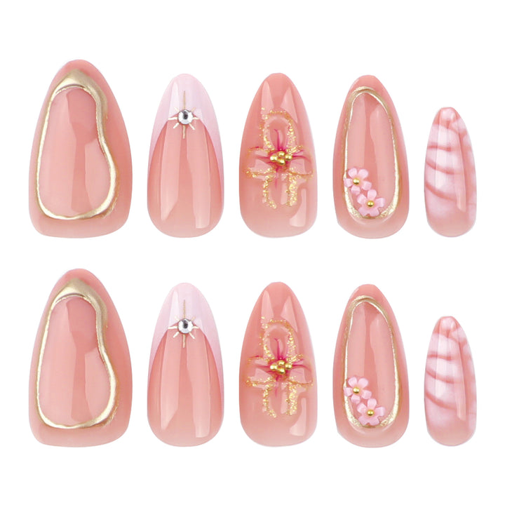 Artful nail design with glitter and floral accents Kalsten