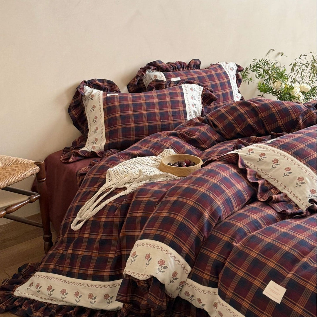 Checked bedding set in vintage cottage style with ruffle and embroidered border