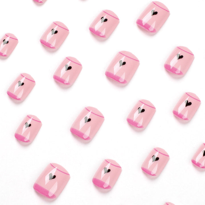 Creative Nail Art with Heart Design and Glitter Accents Kalsten