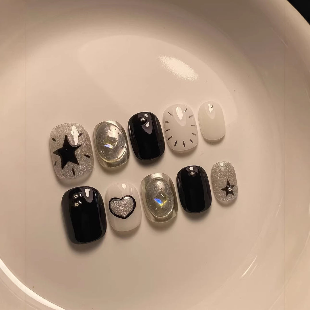 Artistic Press-On Nail Art Set with Geometric and Star Patterns