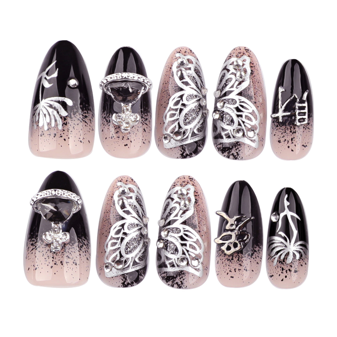 Artful stiletto nails with delicate embellishments and glamour accents Kalsten