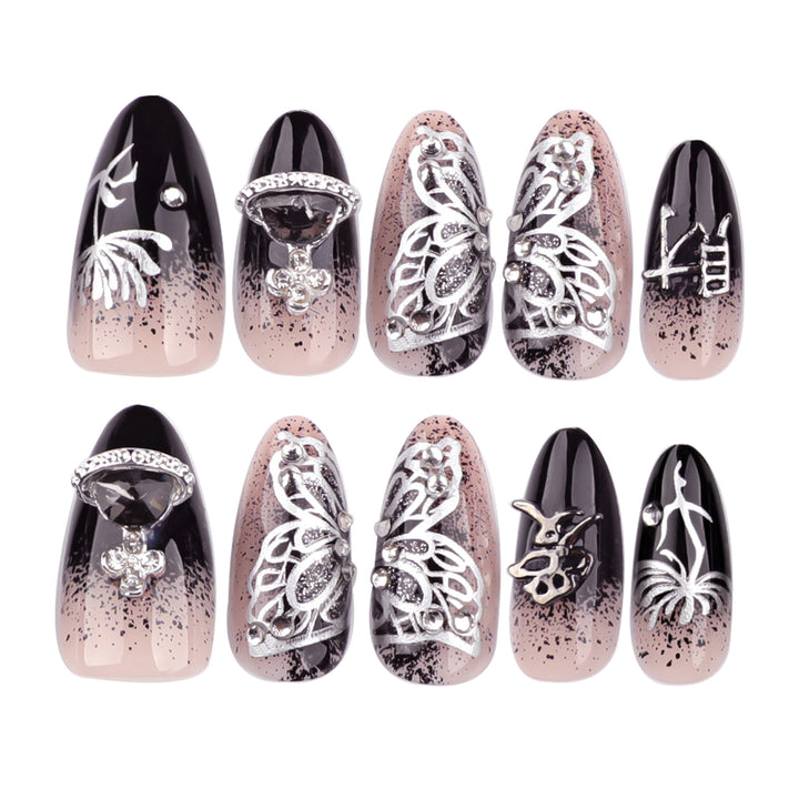 Artful stiletto nails with delicate embellishments and glamour accents Kalsten