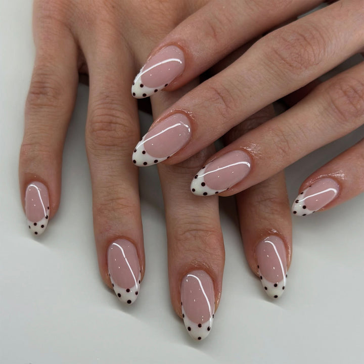 Artful manicure with elegant French tip Kalsten