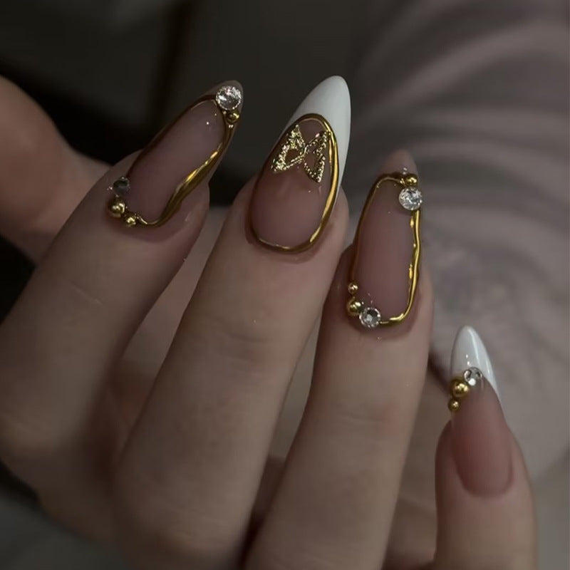 Artificial nail set with elegant gold accents and luxurious decorations Kalsten