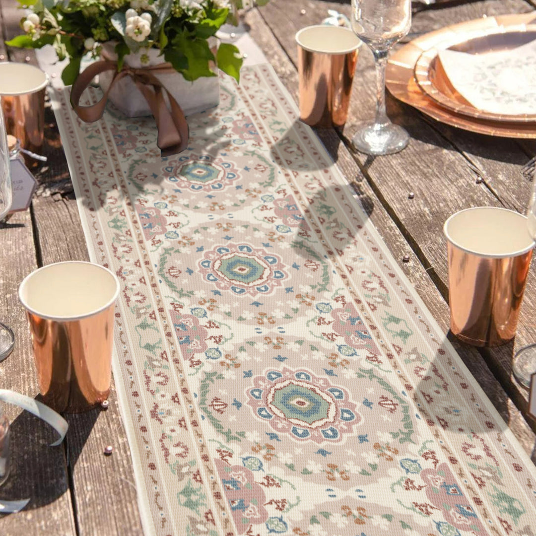 Jacquard table runner with floral border pattern and fringes