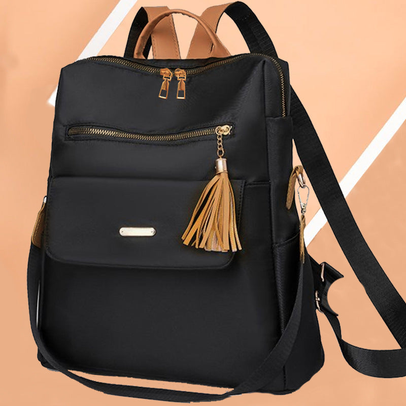 Multi-Functional Backpack with Decorative Tassel Kalsten