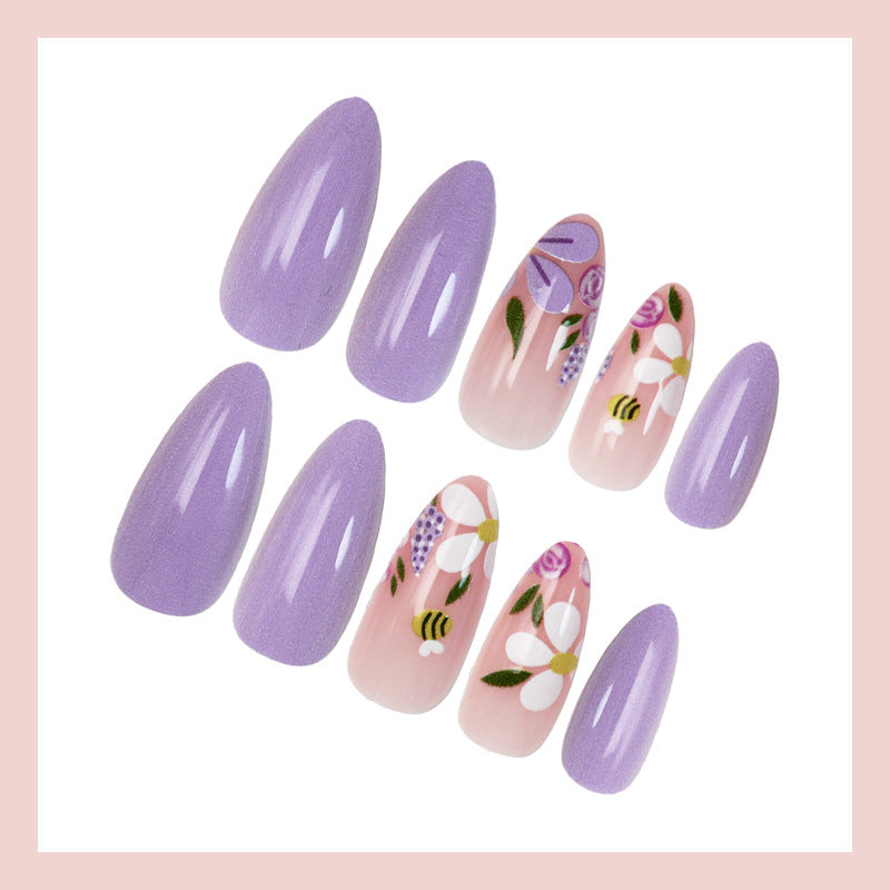 Artificial nail set with playful flower and bee designs Kalsten