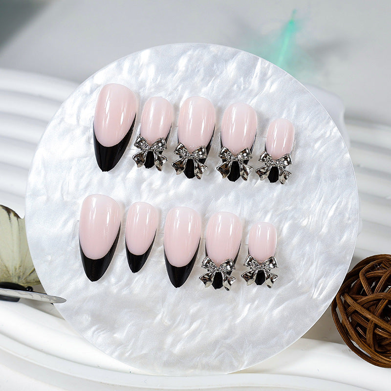 Nail art set with elegant tips and artistic embellishments Kalsten