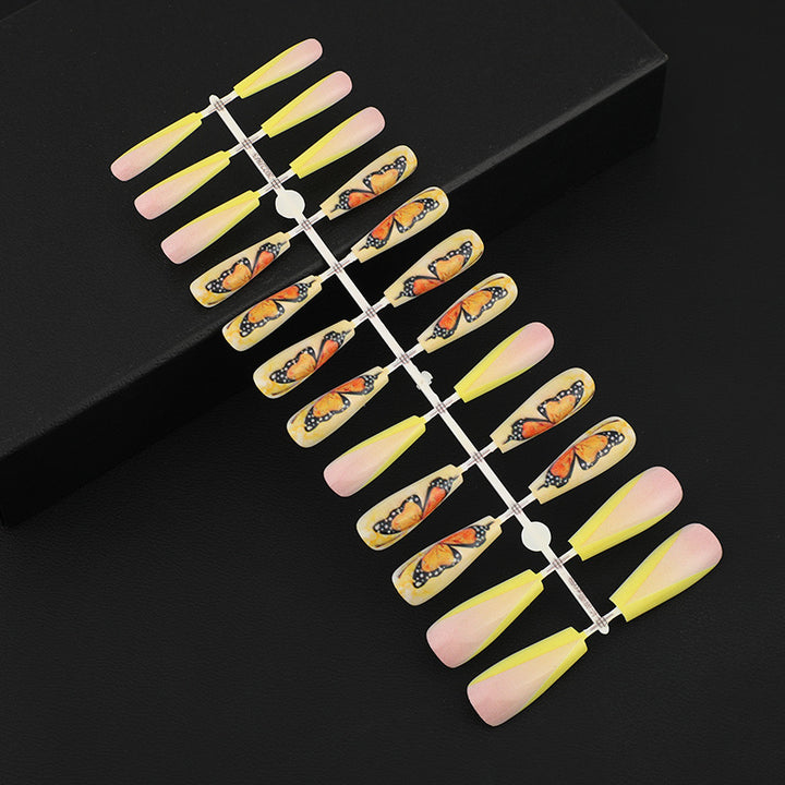 Art nails with butterfly motif Kalsten