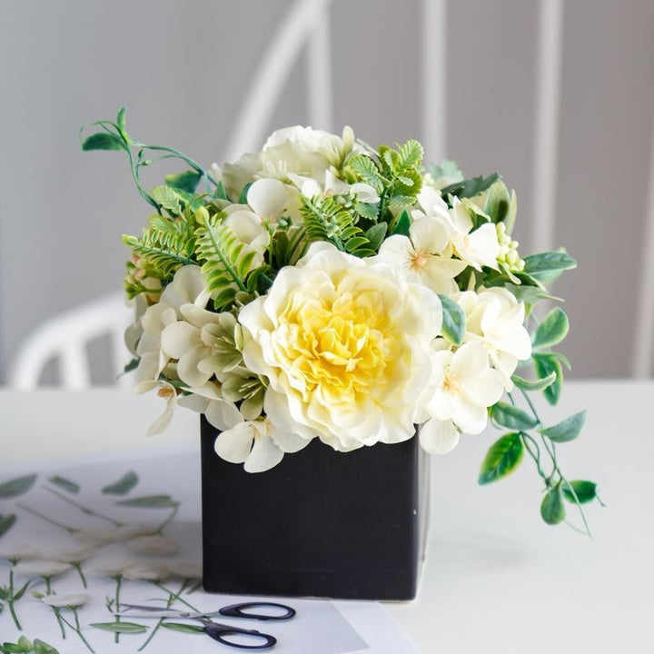 Lifelike Floral Arrangement in Decorative Square Planter