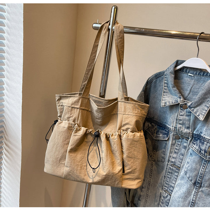 Practical everyday handbag with drawstring Kalsten