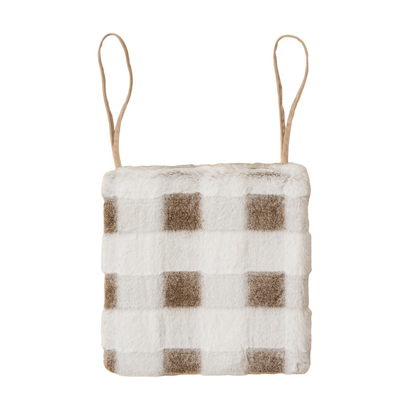 Cozy seat cushion made of faux fur with checked pattern and fastening straps