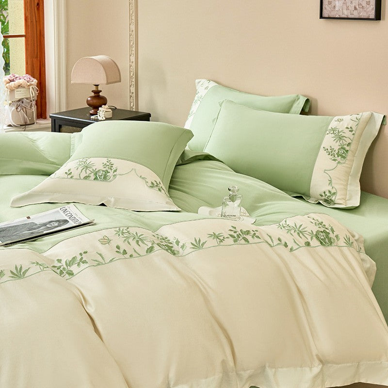 Luxurious bedding set with embroidered border and satin look