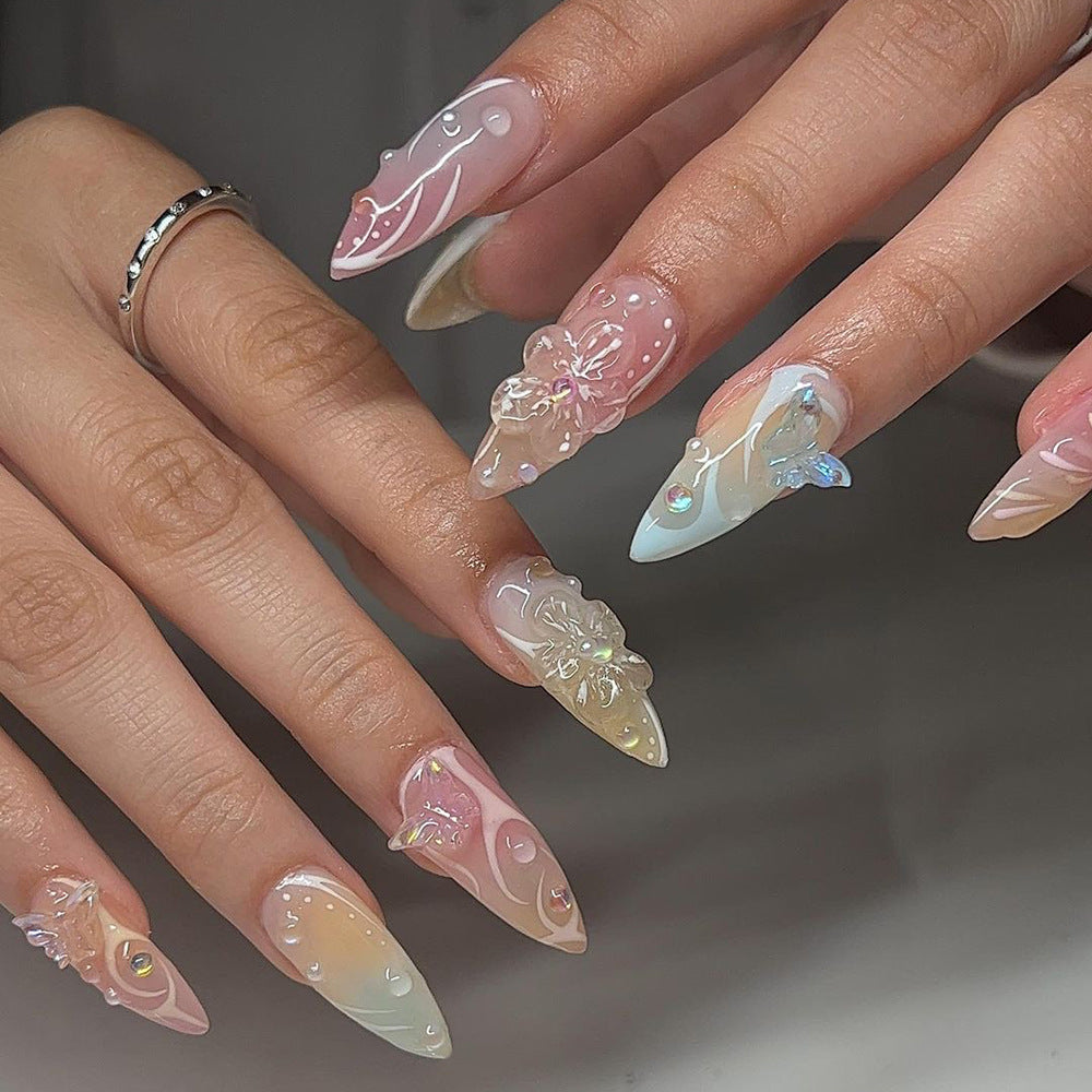 Artful Nail Extensions with 3D Flowers and Glitter Accents Kalsten