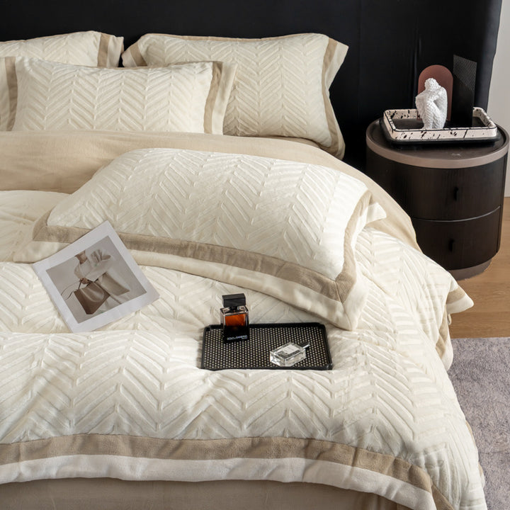 Padded velvet-look bedding set with chevron relief and piping edge