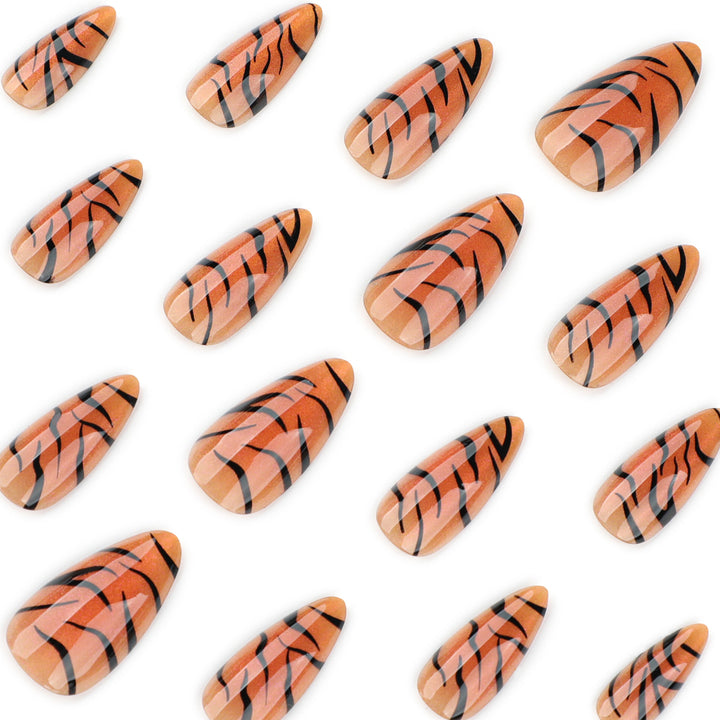 Artful stiletto nails with creative tiger stripe design Kalsten
